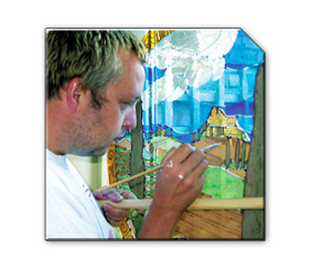 Ian working on a painted and stained glass installation